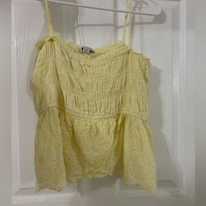 American Eagle yellow top.